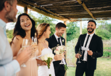 wedding party group drinking and laughing Funny Marriage Advice for Newlyweds